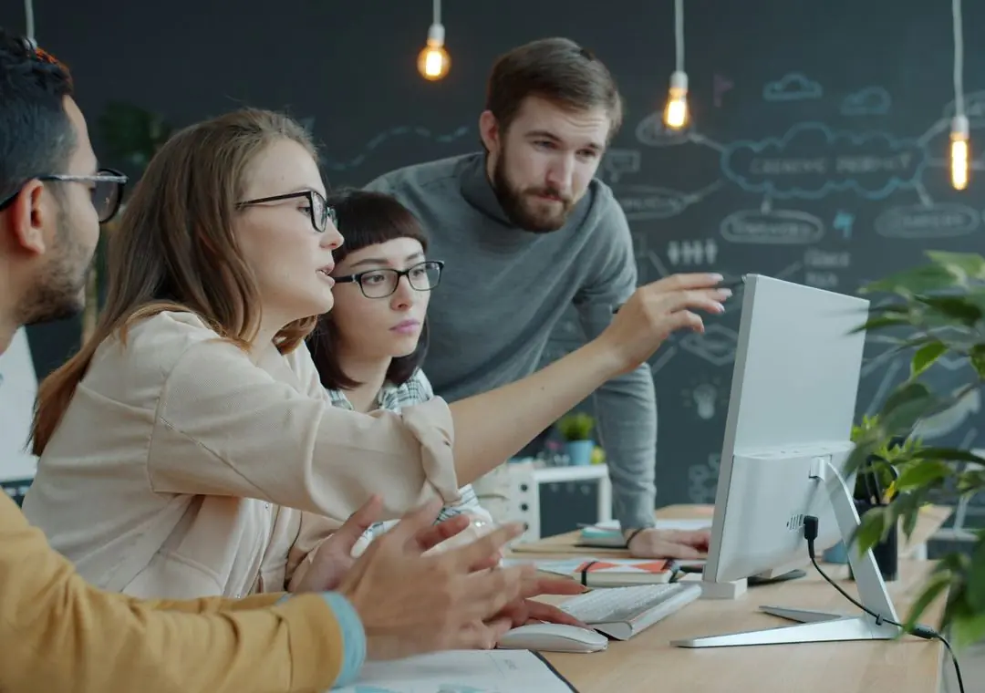 ERP consultants reviewing an implementation with a client team